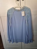 Blue blouse with stand-up collar and decorative embroidery