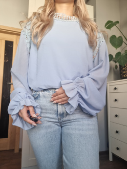 Blue blouse with stand-up collar and decorative embroidery