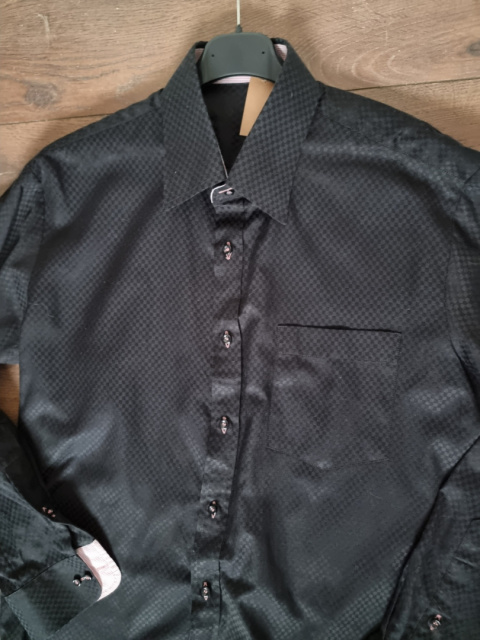 Elegant black men's shirt with a subtle pattern Elegant black men's shirt with a subtle pattern