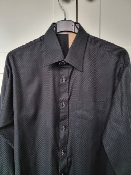 Elegant black men's shirt with a subtle pattern