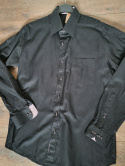 Elegant black men's shirt with a subtle pattern