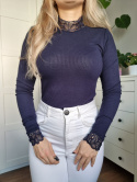 Navy blue ribbed turtleneck with a lace stand-up collar