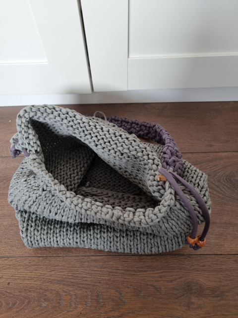 Braided bag with button Braided bag with button