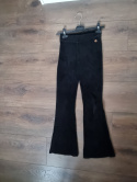 Black flared velvet-like pants for a 140 cm girl