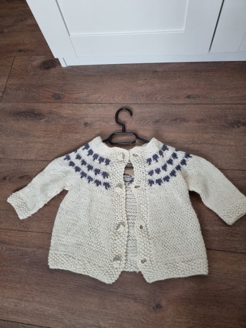 Children's sweater in Scandinavian style, handmade from wool.