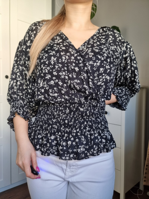 Floral blouse with ribbing