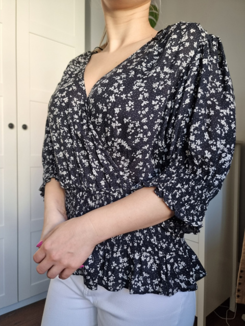 Floral blouse with ribbing Floral blouse with ribbing