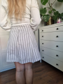 White trapezoidal skirt with black stripes