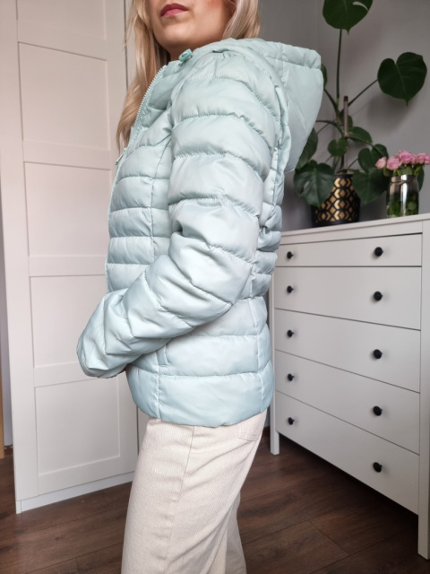Pistachio quilted jacket with a hood for spring Pistachio quilted jacket with a hood for spring
