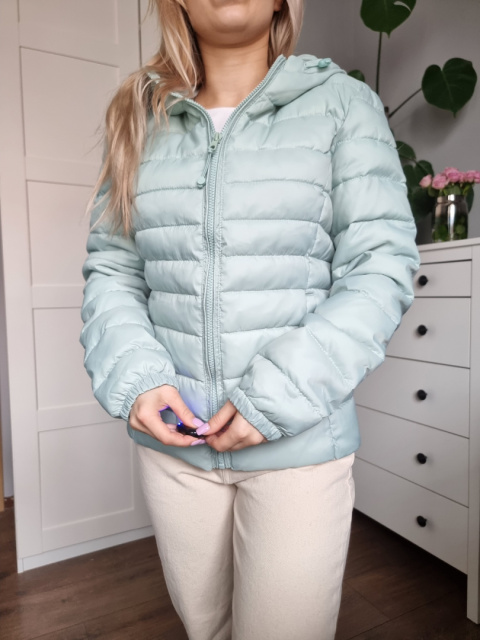 Pistachio quilted jacket with a hood for spring Pistachio quilted jacket with a hood for spring