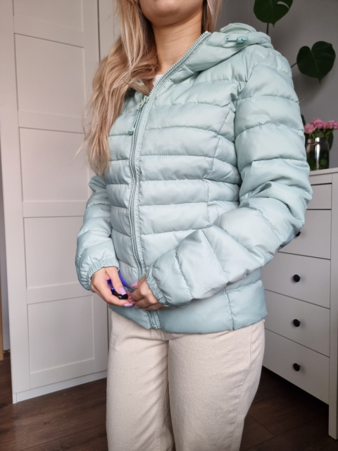 Pistachio quilted jacket with a hood for spring Pistachio quilted jacket with a hood for spring