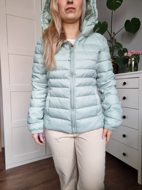 Pistachio quilted jacket with a hood for spring Pistachio quilted jacket with a hood for spring